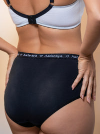 Dina AD Logo Full Brief in Black, Scattered Dot, Mini Check & White Polka 4 Pack - back view showing full back coverage