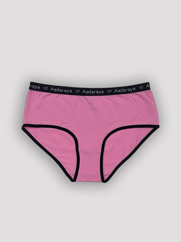 Pink underwear with black trim on a light gray background