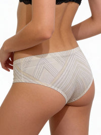 Patterned underwear worn by a person on a white background