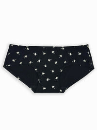 Black underwear with white floral pattern on a white background