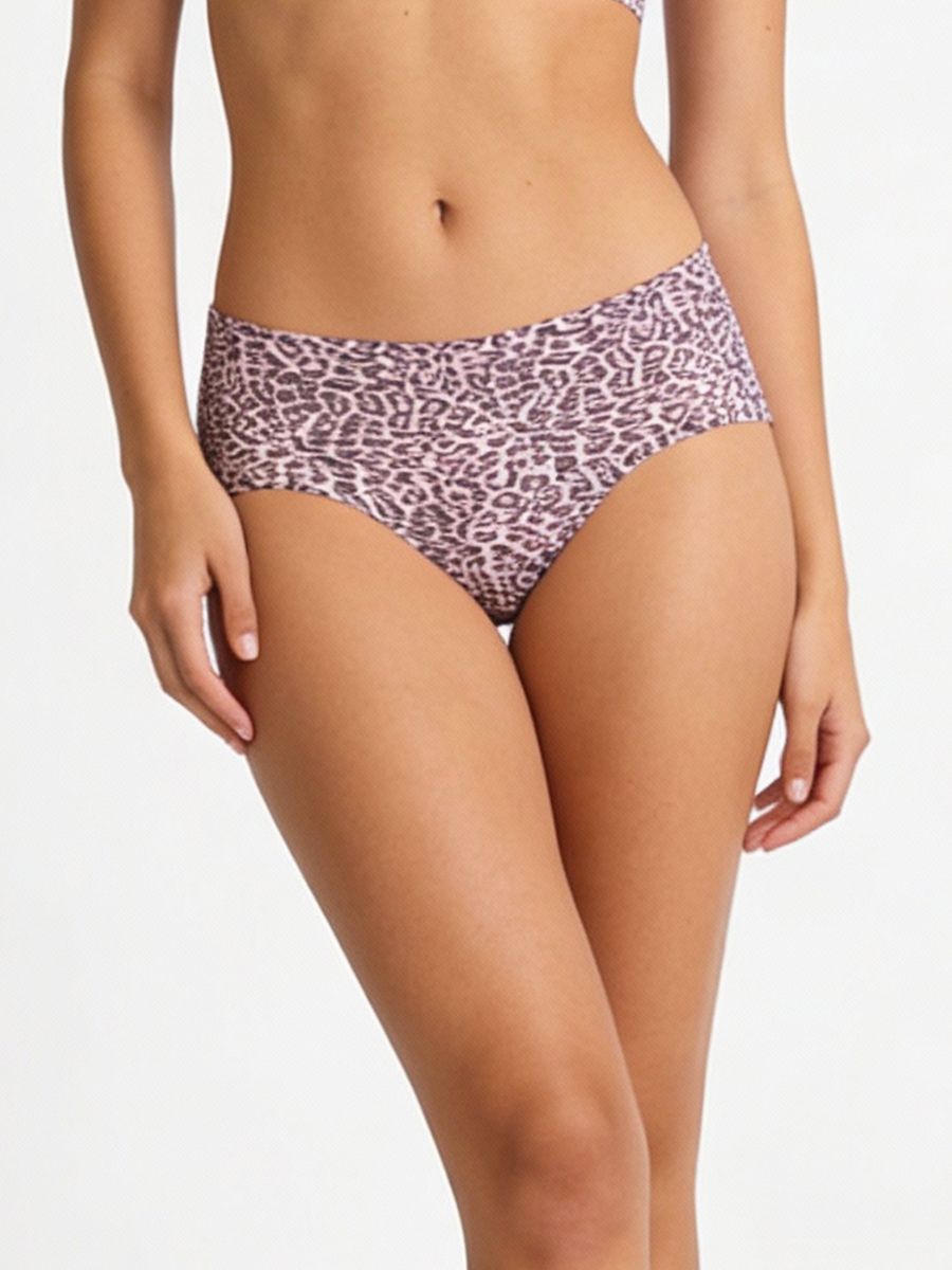 Person wearing a patterned bikini bottom on a plain background