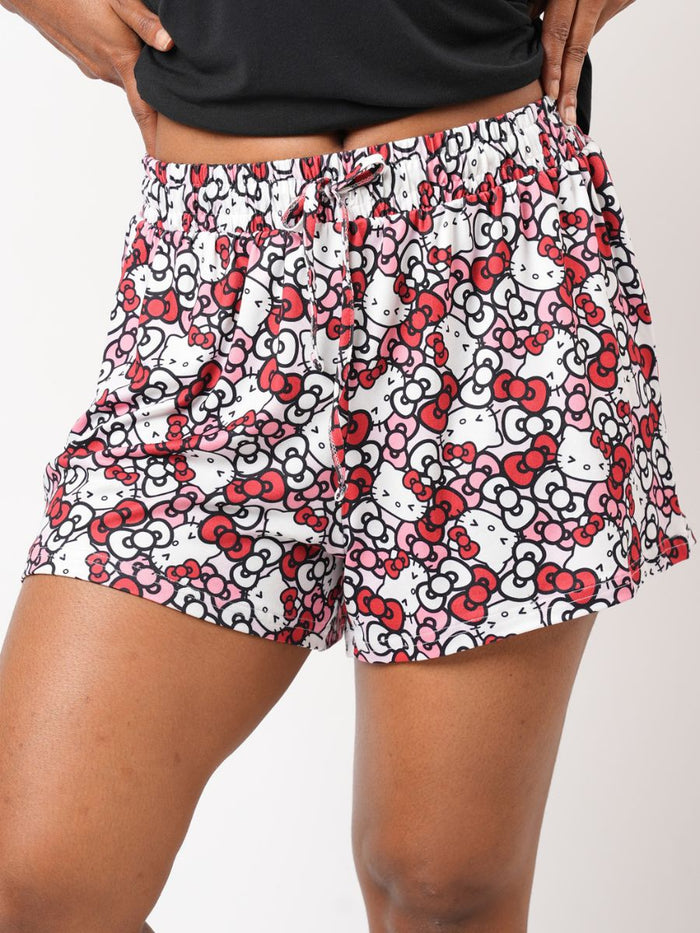 Shorts with a red and white pattern on a plain background
