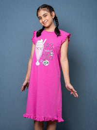 Girl wearing a Magenta dress with a graphic design 
