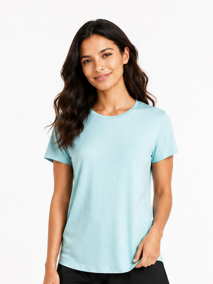 Woman wearing a light blue t-shirt on a white background