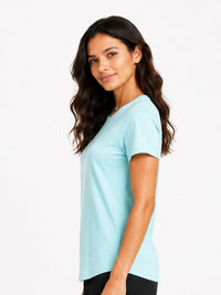 Woman wearing a light blue t-shirt on a white background