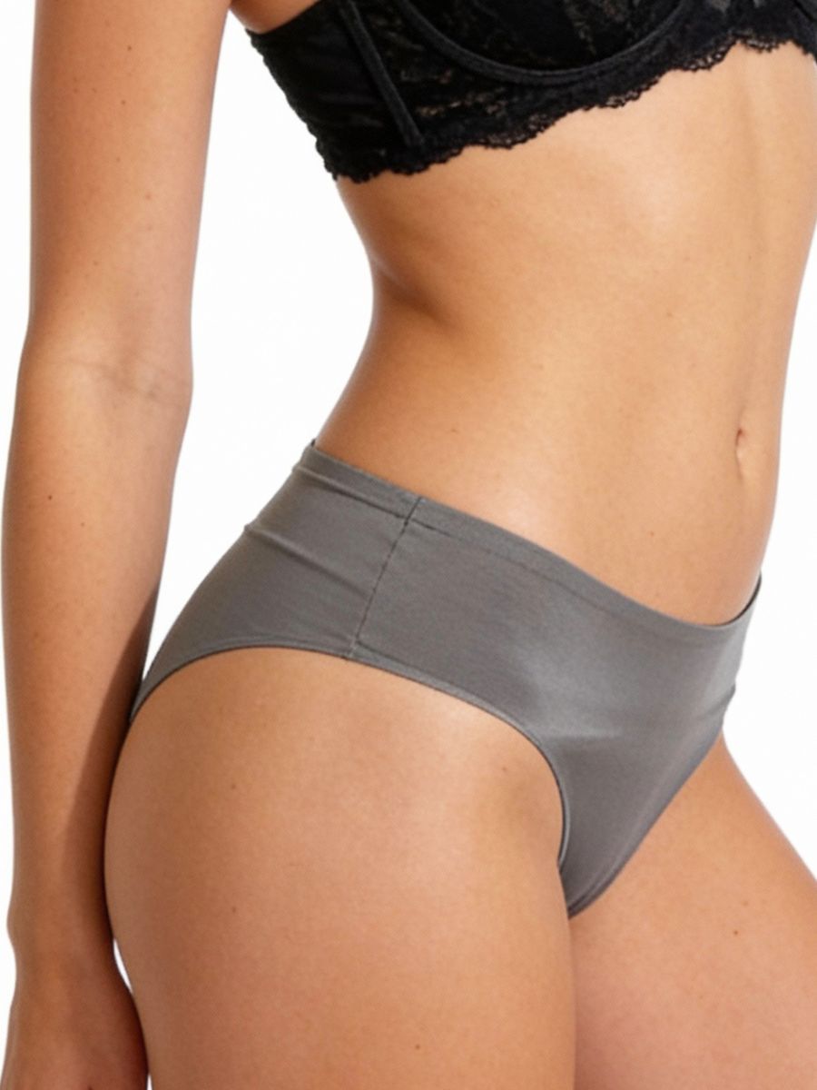 Person wearing gray underwear on a white background
