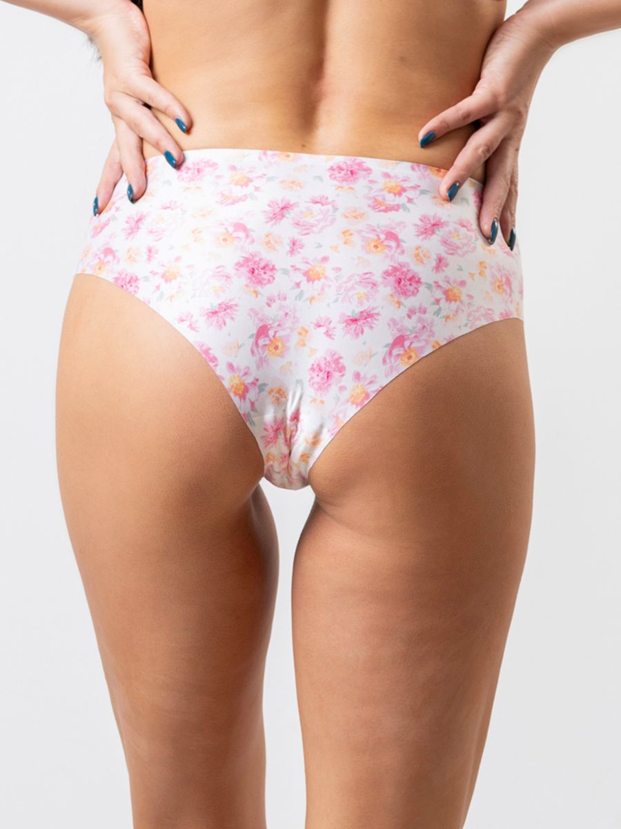 Floral-patterned underwear worn by a person on a plain background