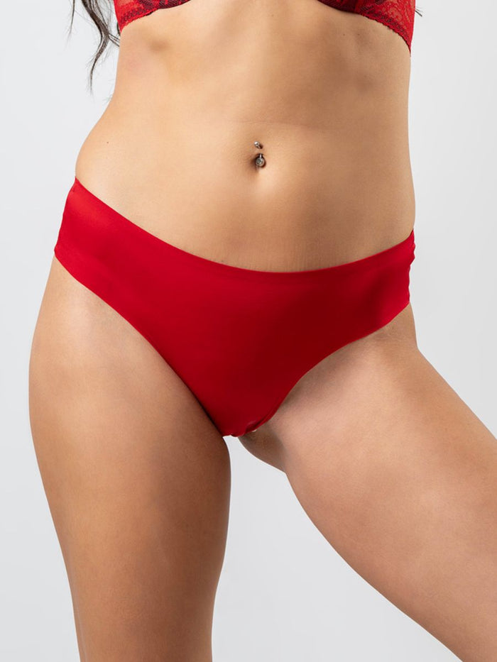 Red bikini bottom on a plain background