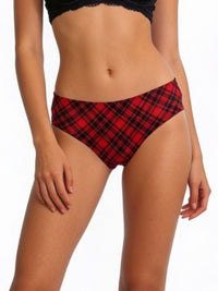 Red plaid bikini bottom worn by a person on a white background